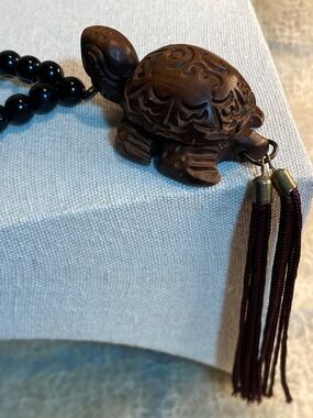 Carved Wood Turtle Amulet w/ Om Symbol & Tassel | Black Bead Worry Beads Decor